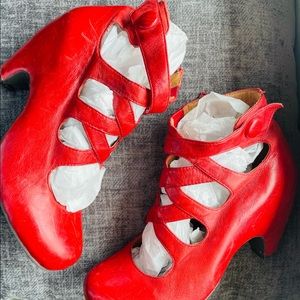 Red cris cross heels